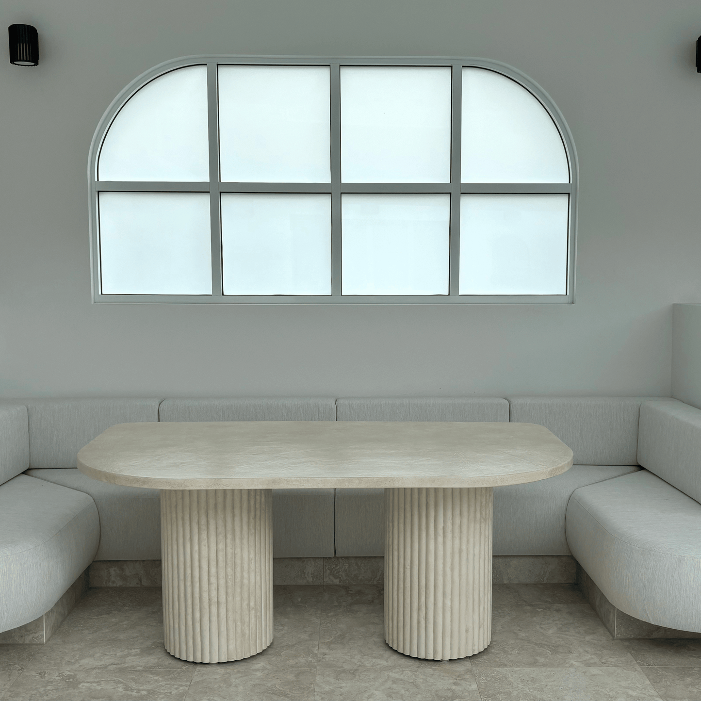 arch dining table in sand stonewash