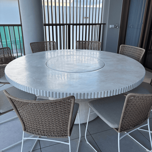 enzo round dining table in sand stonewash