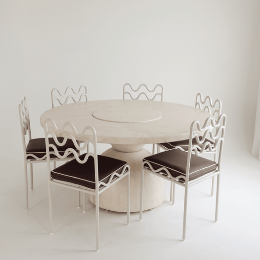 lotus round dining table styled with chairs