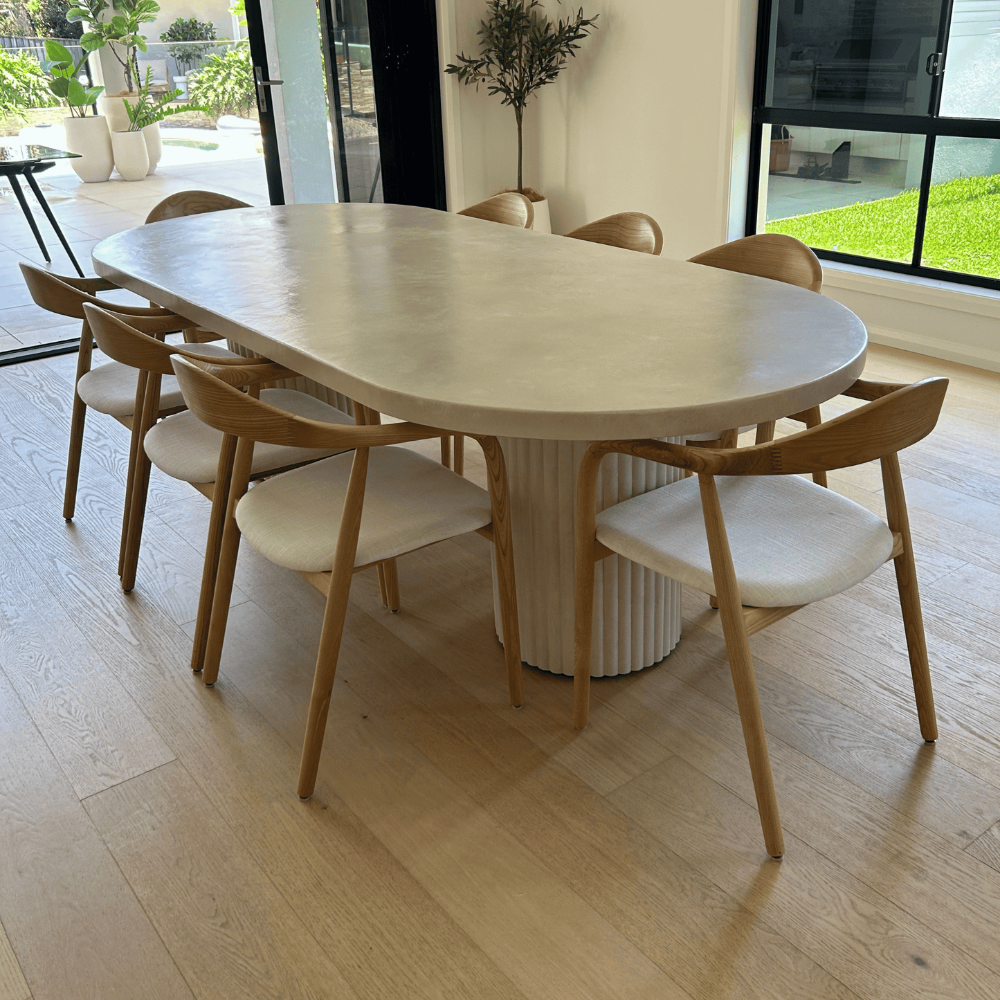 bilinga sand stonewash oval dining table