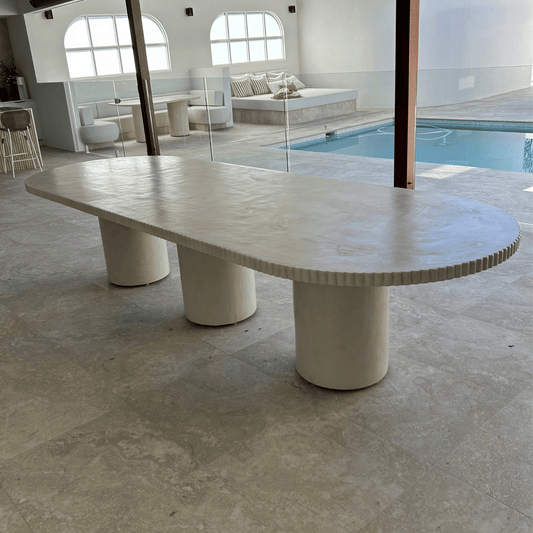 ribbed edge smooth pillar table with three legs