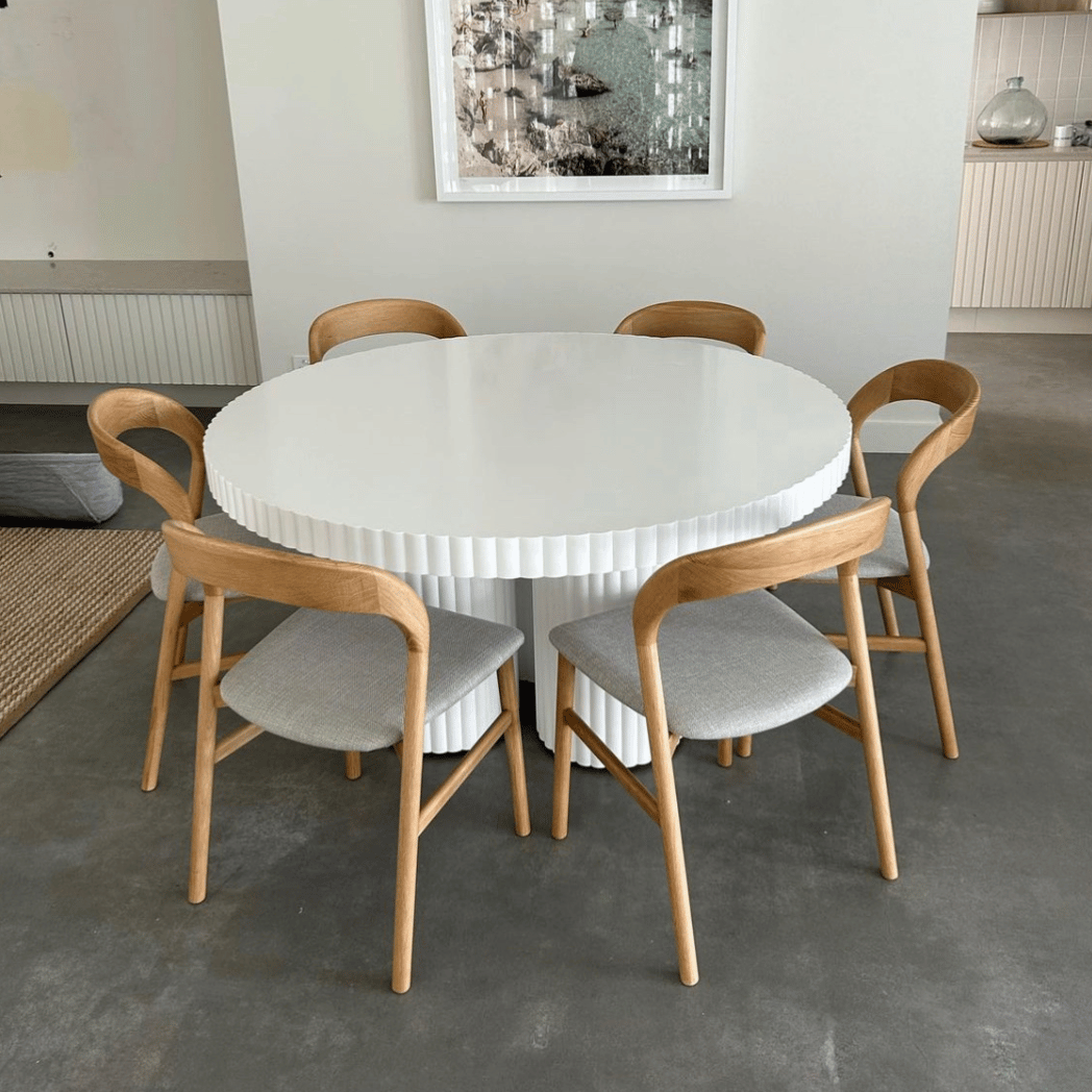 ribbed white triple leg round dining