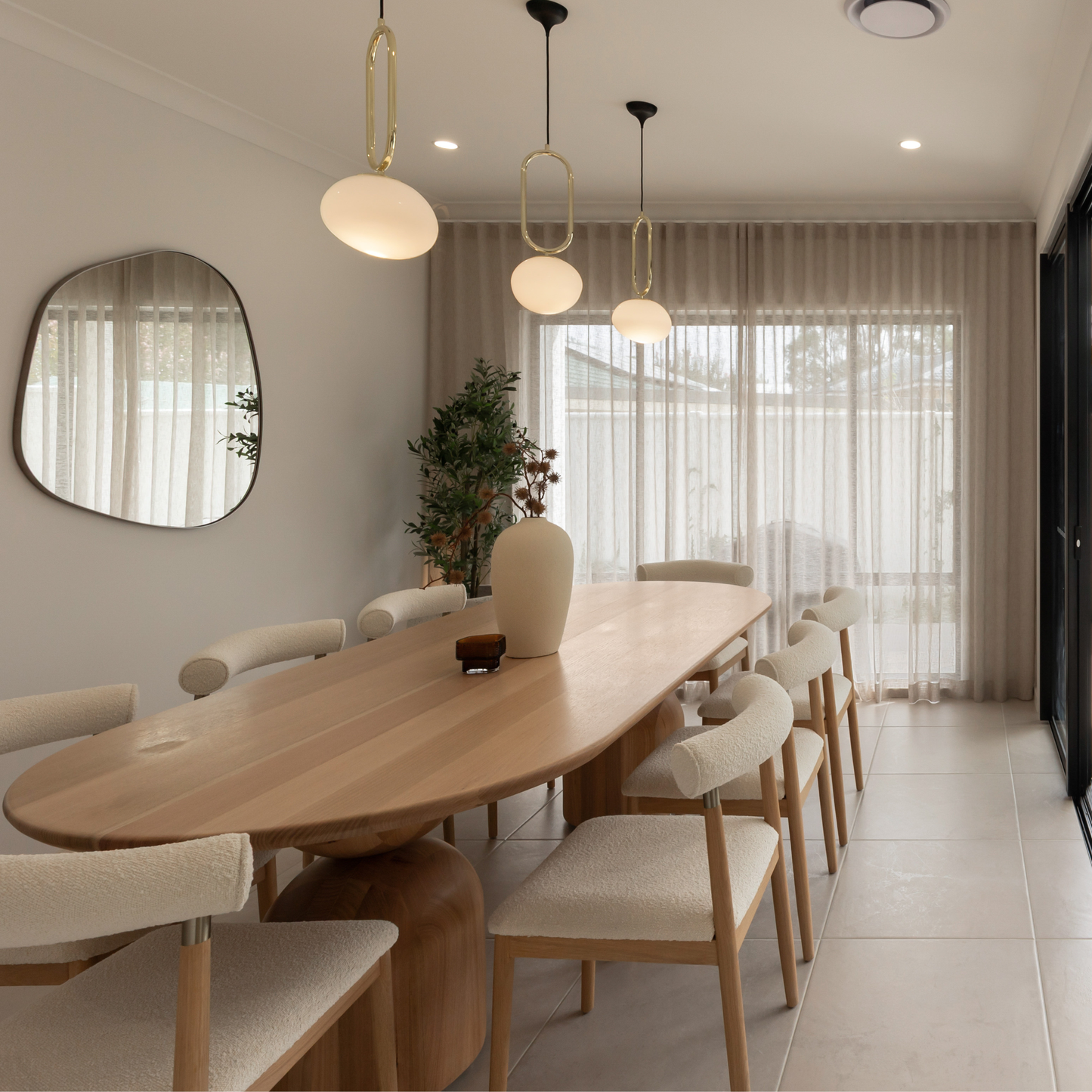 sorrento hourglass dining table styled