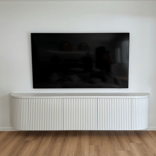 white fluted curved entertainment unit
