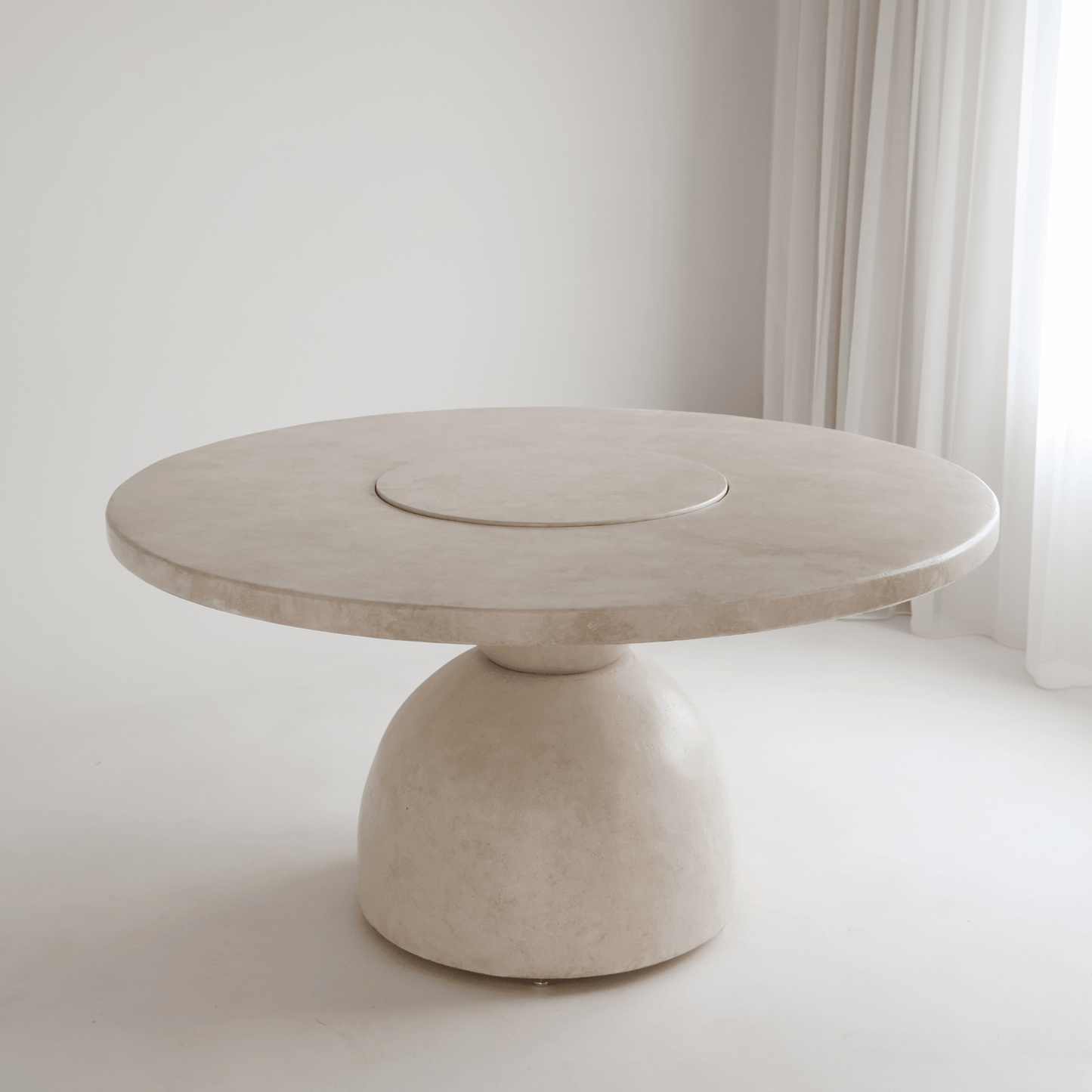 lotus round dining table in sand stonewash