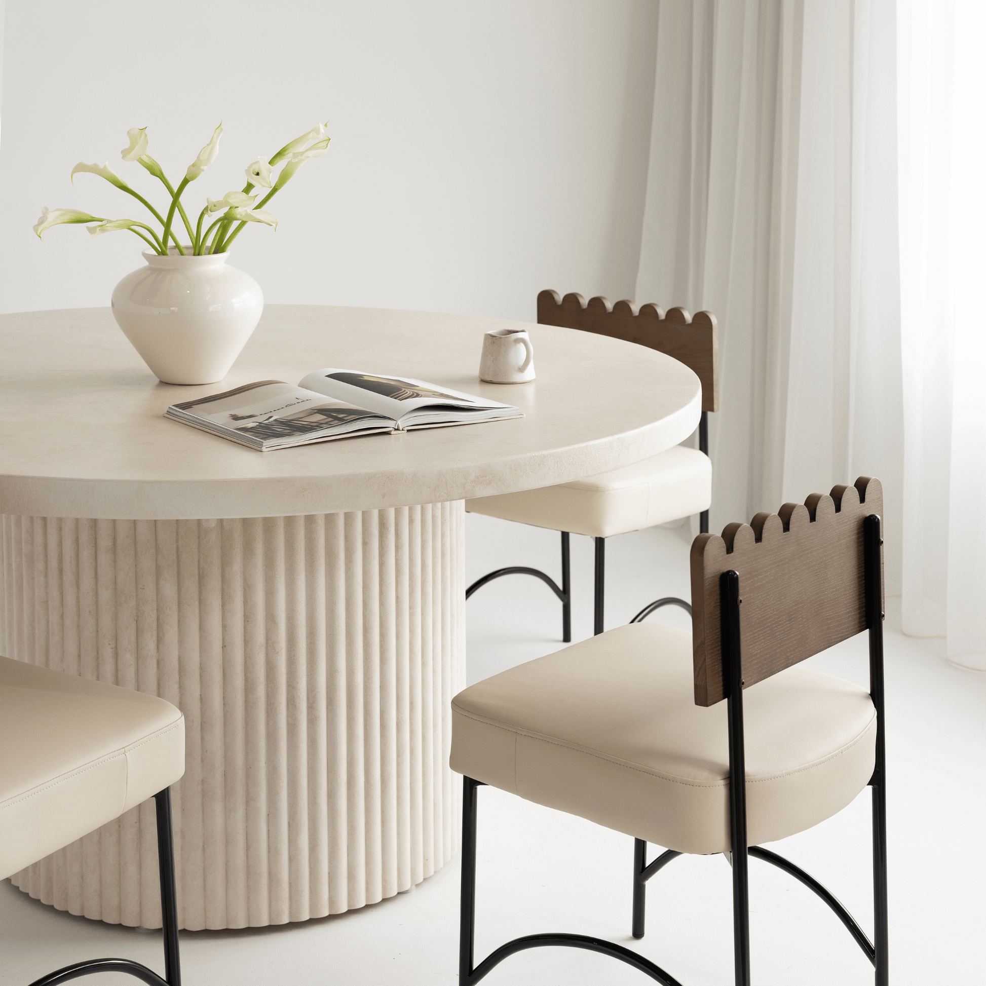 Albany round dining table styled with Onyx beige chairs