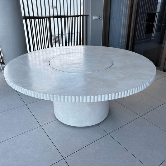 enzo round dining table in sand stonewash