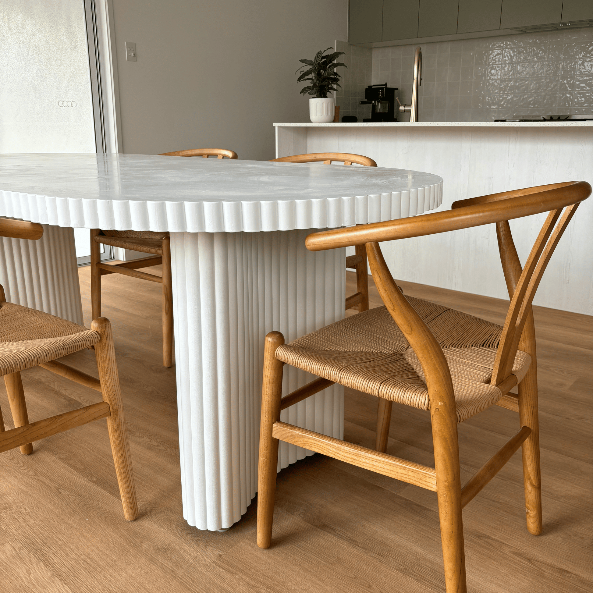 white microcement ribbed edge jellybean leg