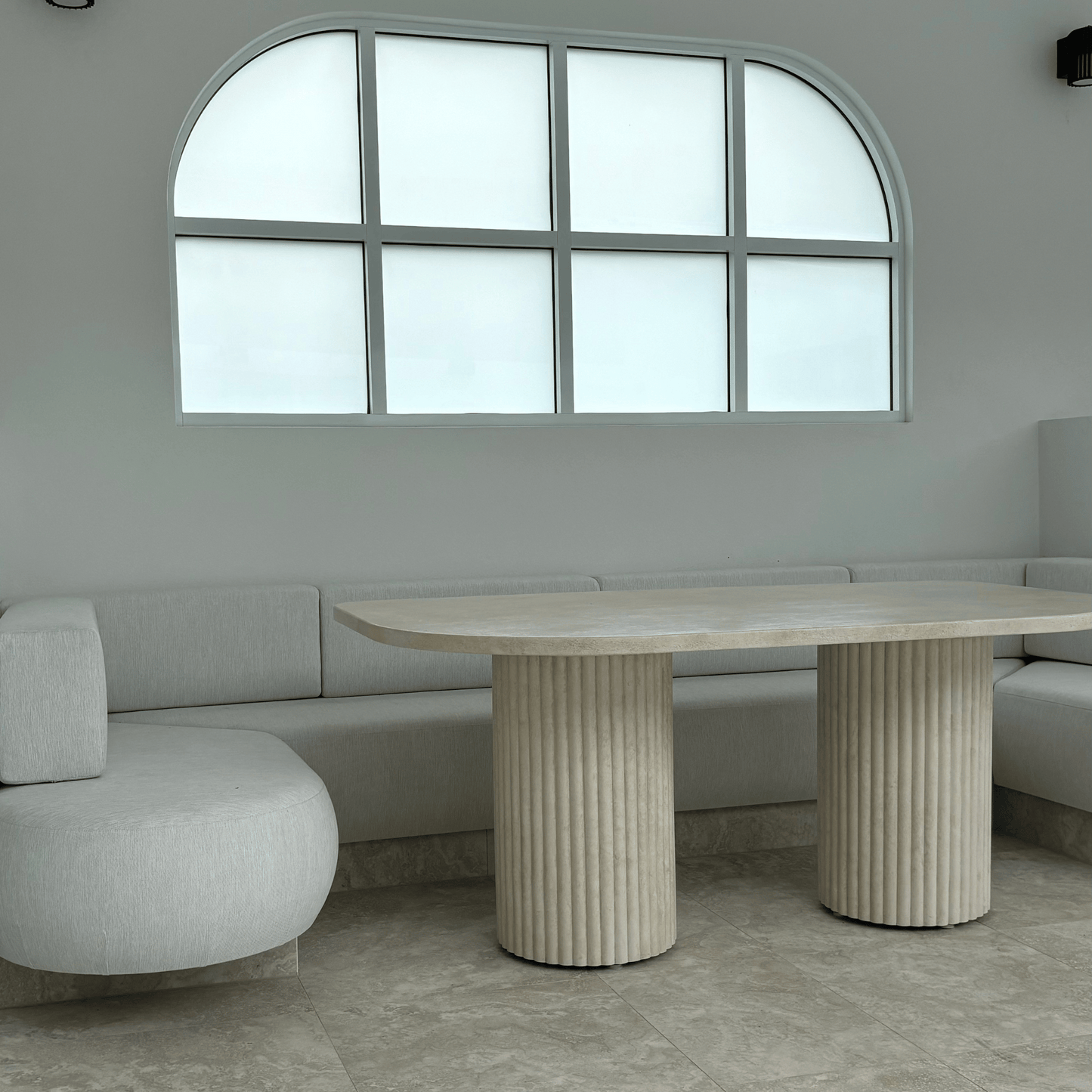 arch dining table in sand stonewash
