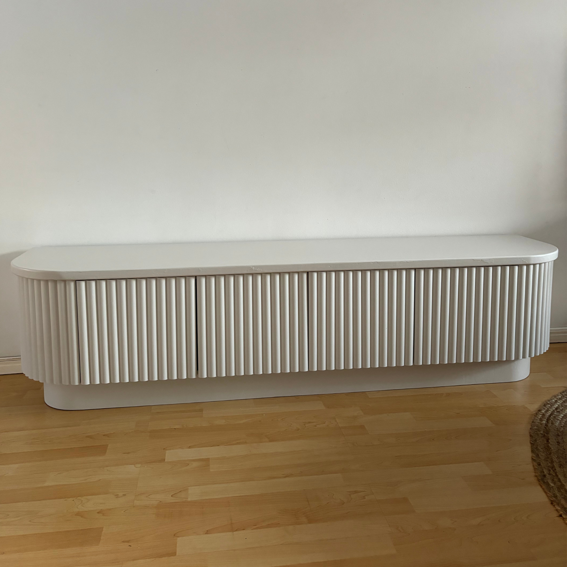 freestanding fluted curved entertainment unit