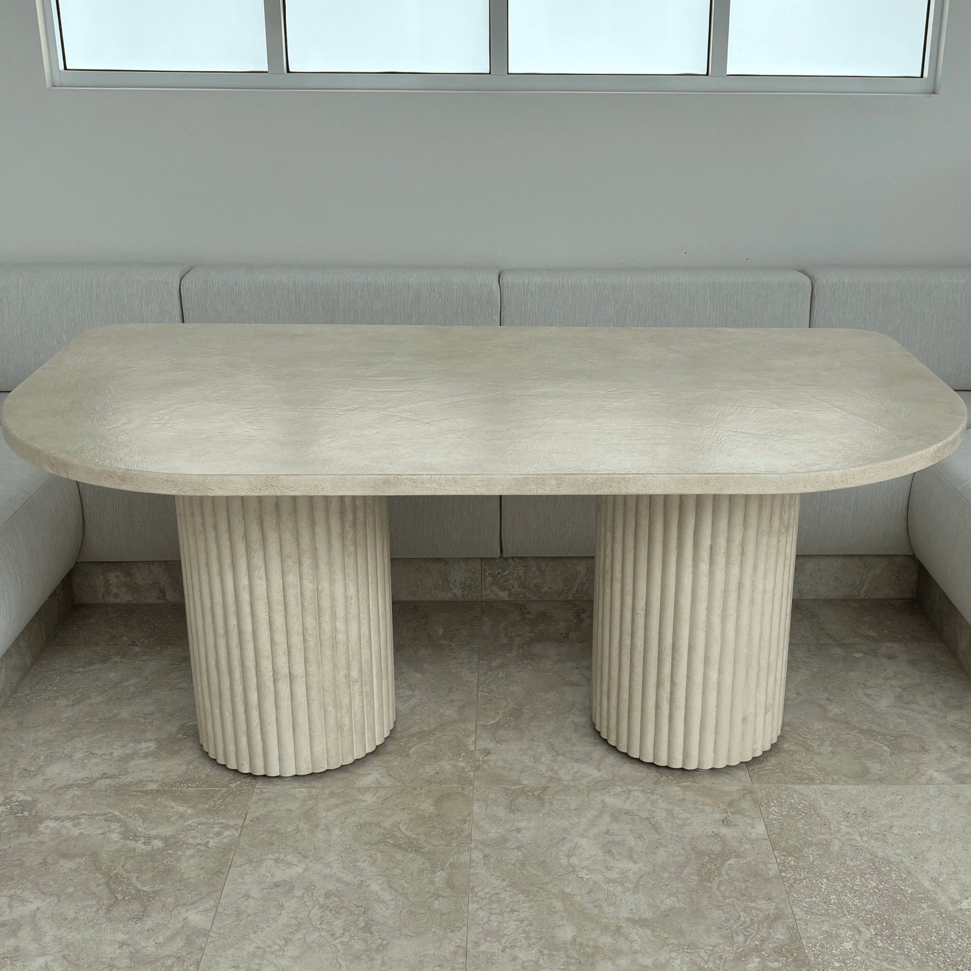 arch dining table in sand stonewash
