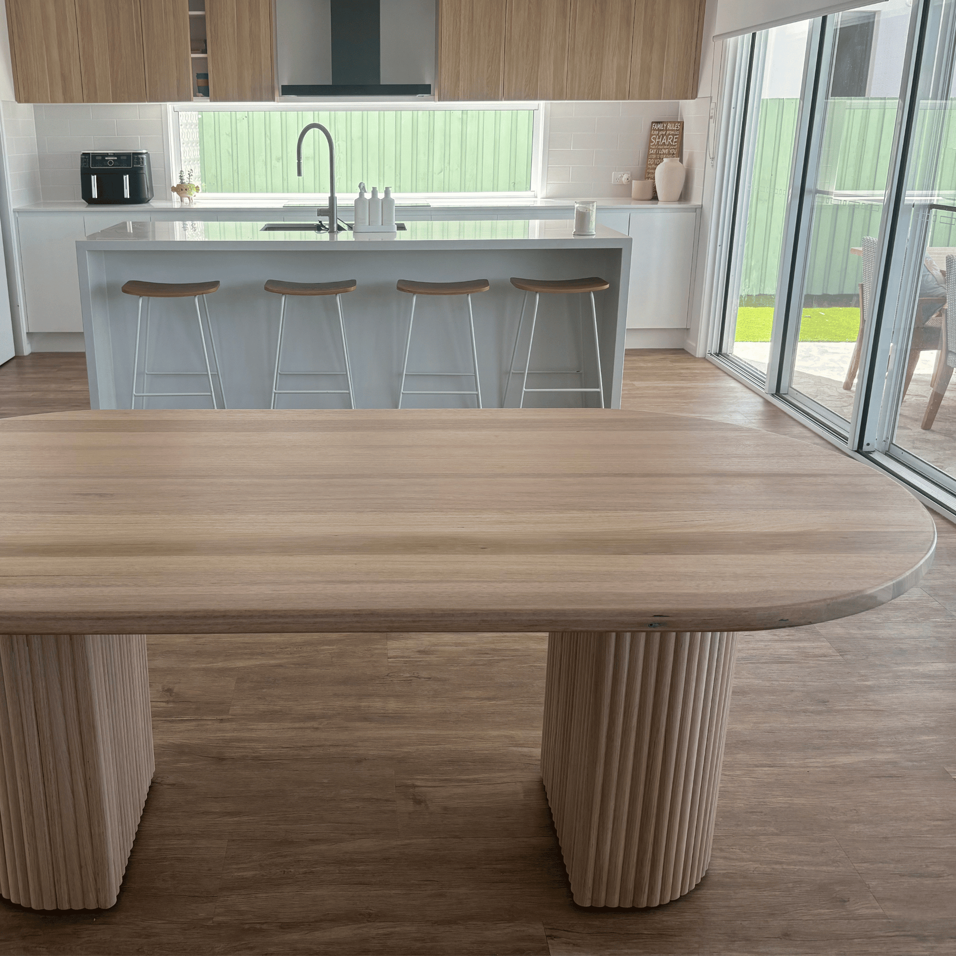 Tasmanian Oak oval dining with Snow finish