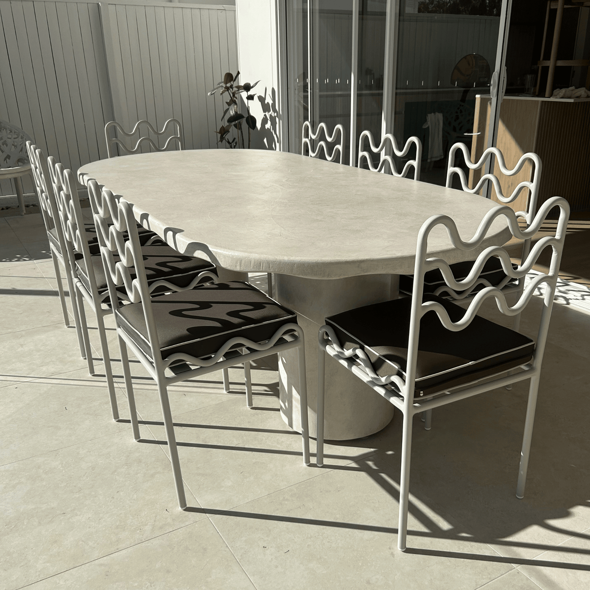 solea dining in sand stonewash paired with the horizon dining table