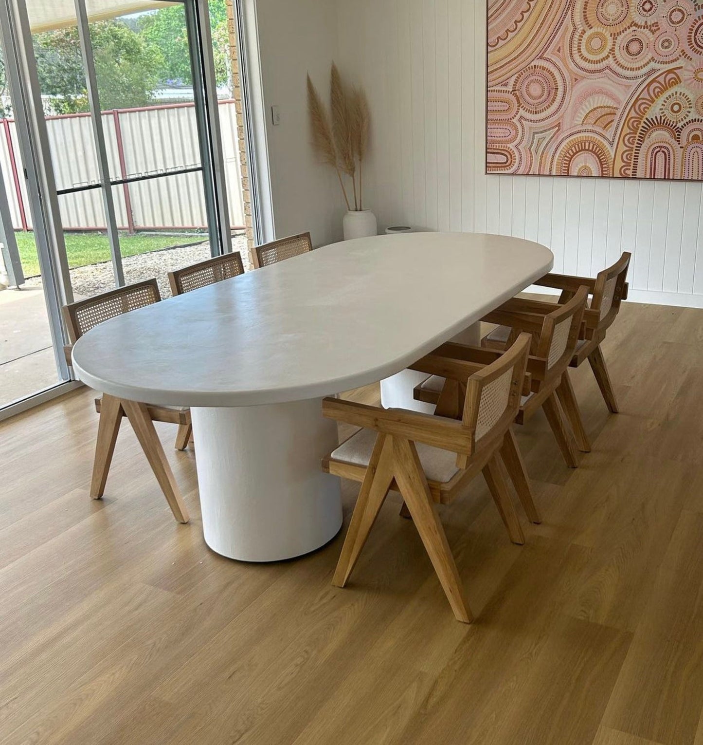 white pillar dining table