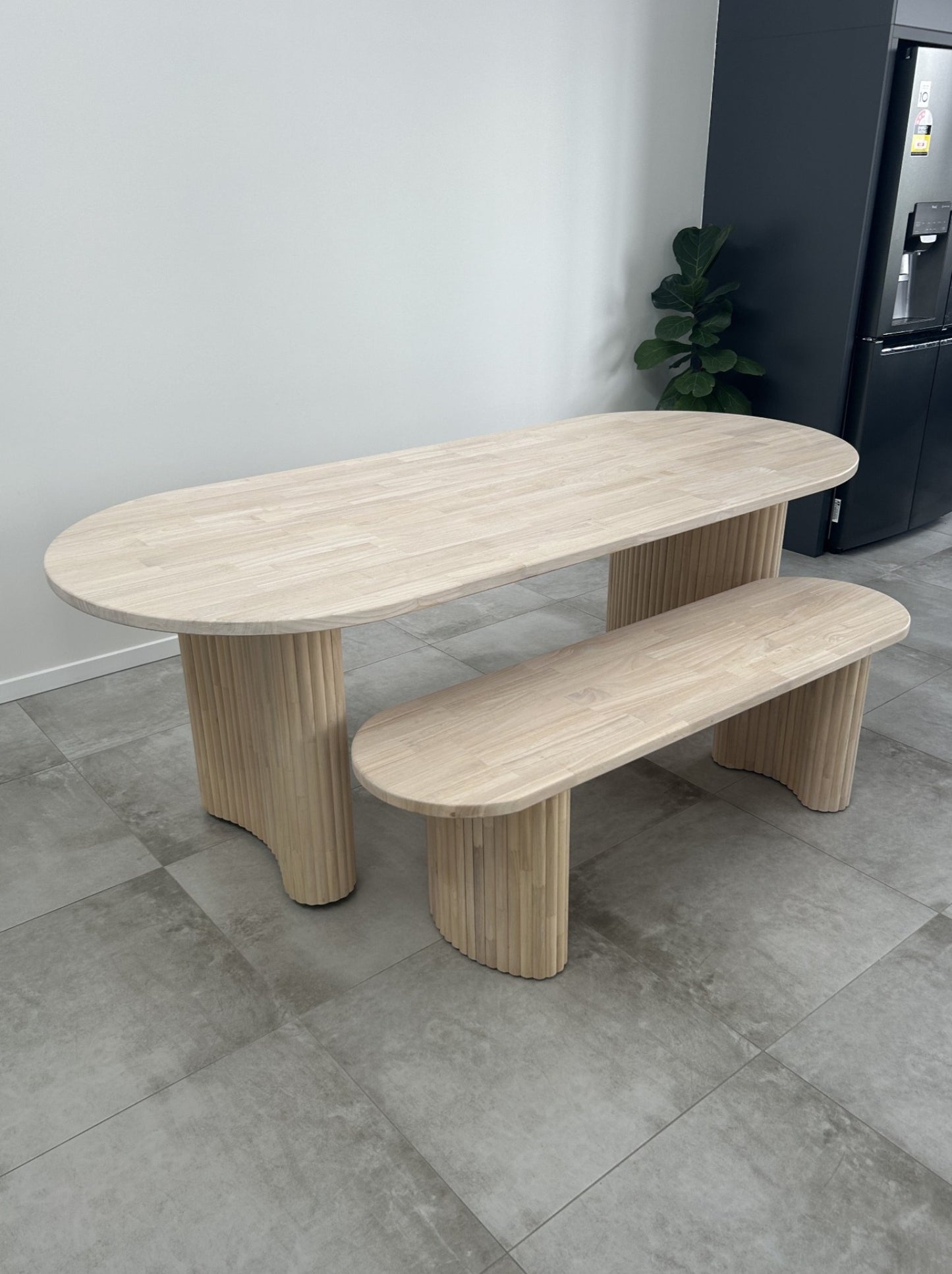 light ash timber dining table with jellybean legs