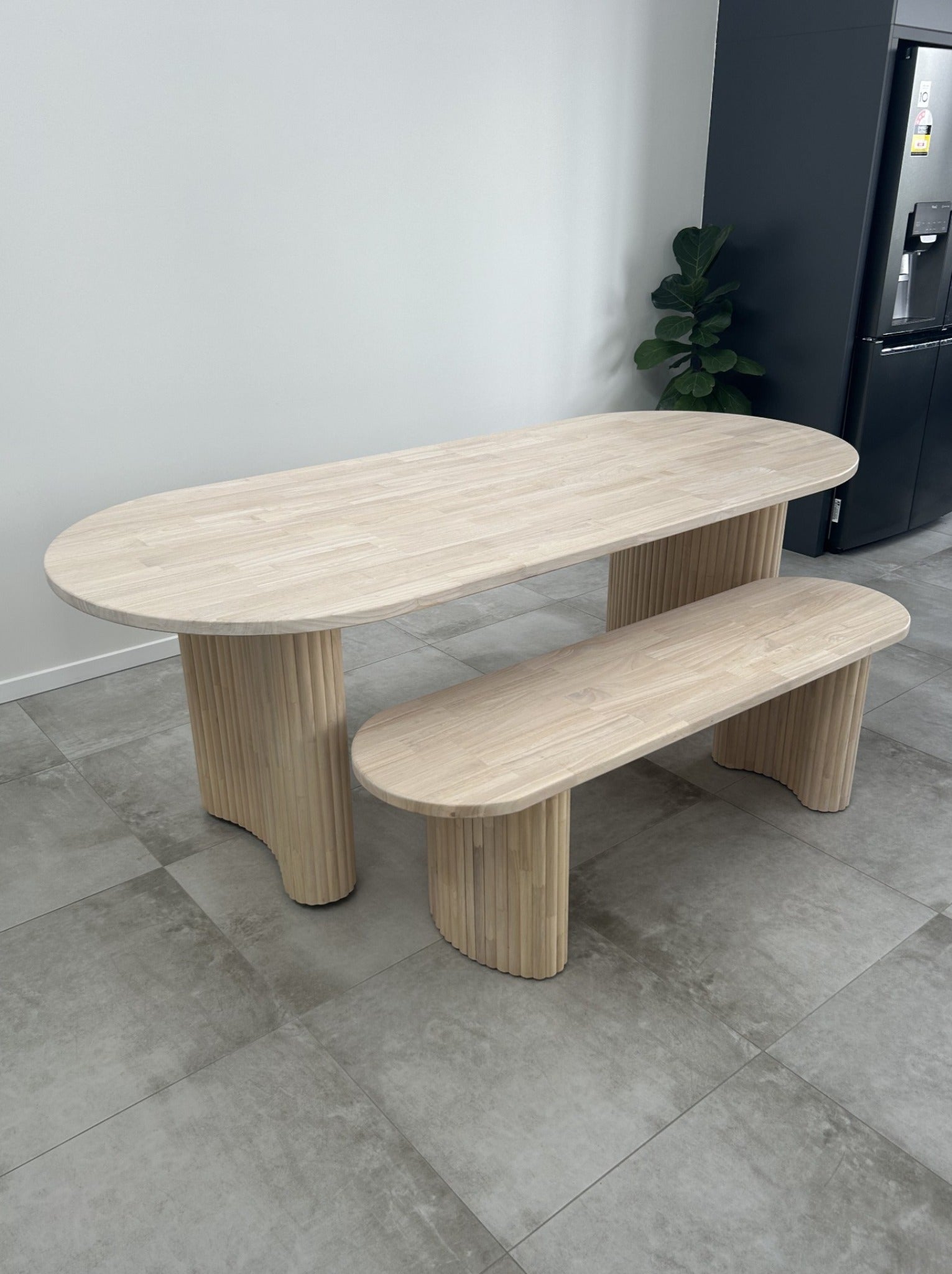 light ash timber dining table with jellybean legs