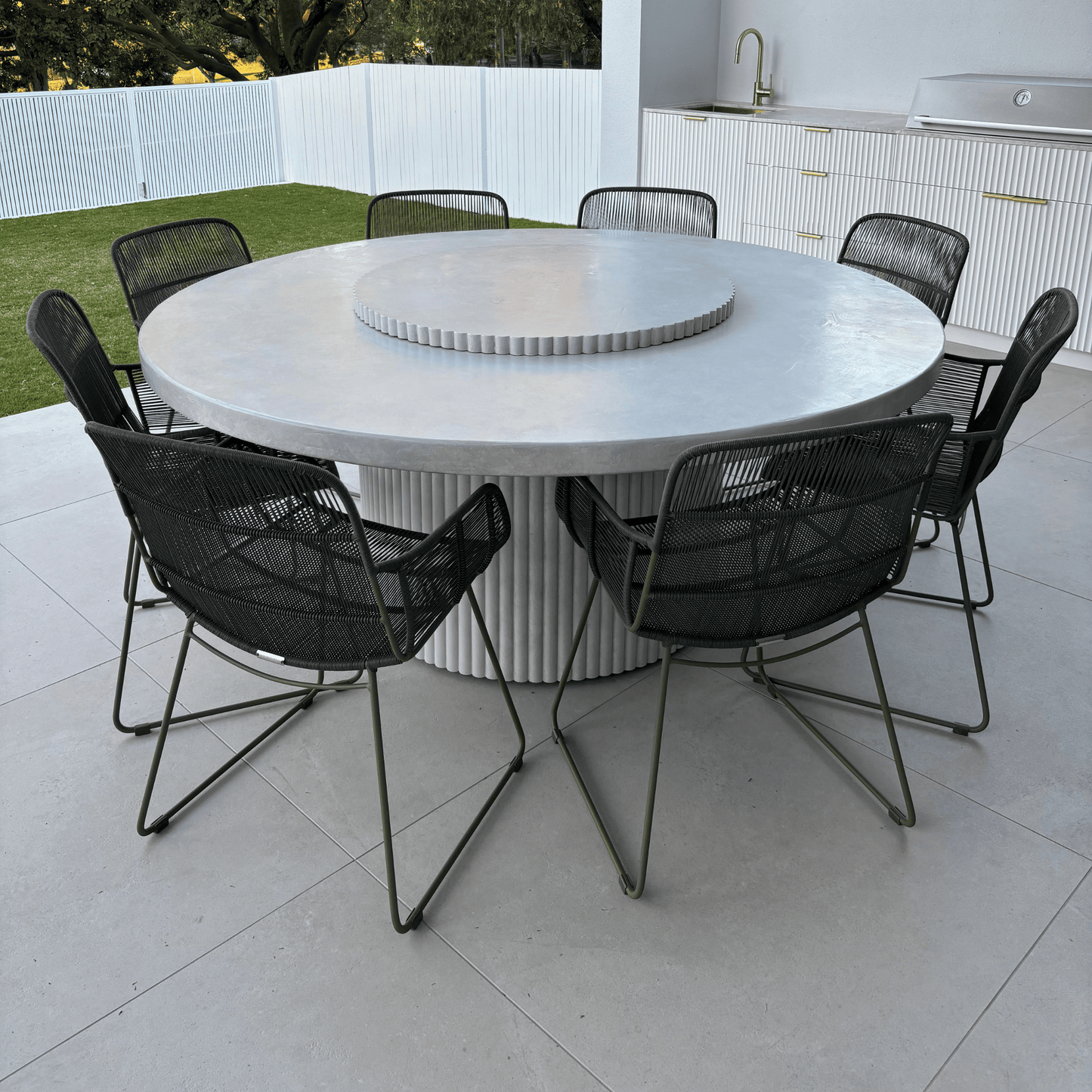 albany round fluted dining table in light stonewash