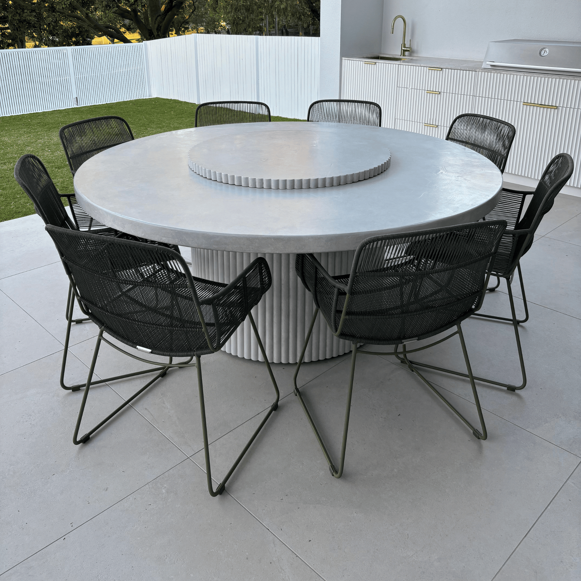 albany round fluted dining table in light stonewash