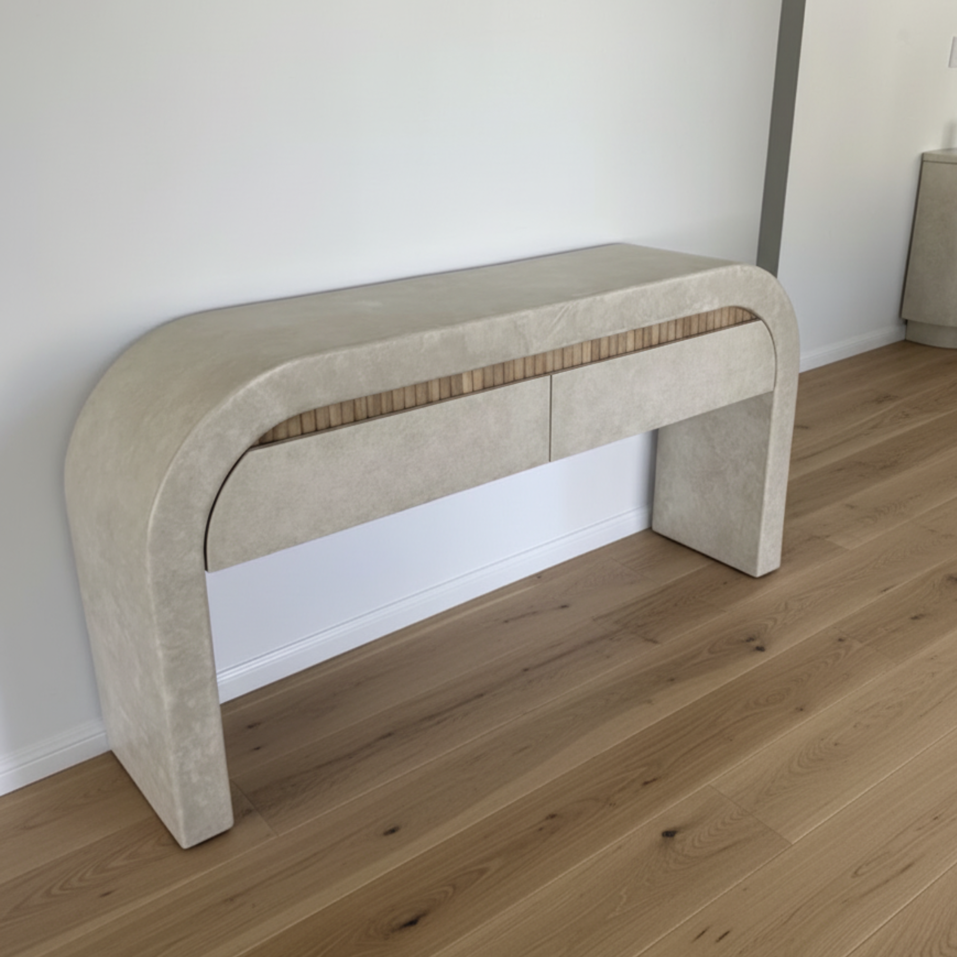 Minyama arch console table in sand stonewash