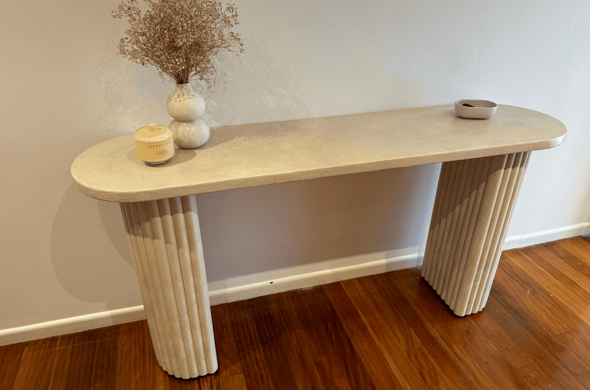 sand stonewash crescent console table