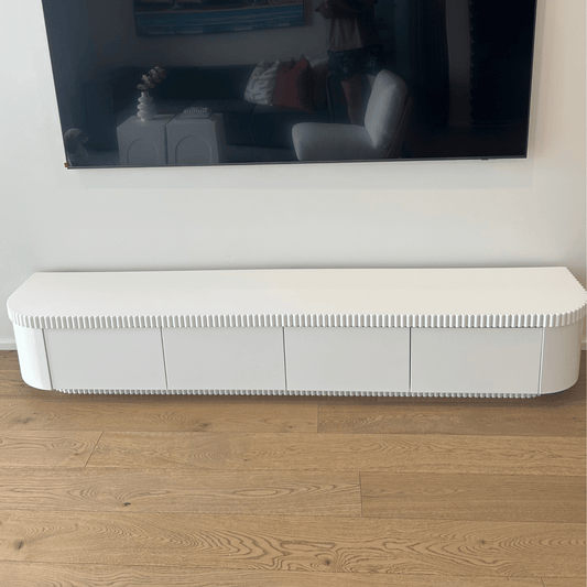 white ribbed tv unit